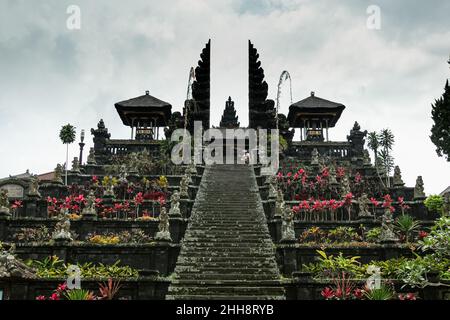 BALI, INDONESIA - FEBRUARY 28, 2014: Pura Besakih temple located on the inclines of Bali largest volcano – Mount Agung, Indonesia Stock Photo