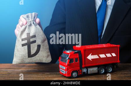 Businessman with turkish lira money bag and truck. Good salaries for drivers. Rising prices, global containers shortage crisis. Logistics. High income Stock Photo