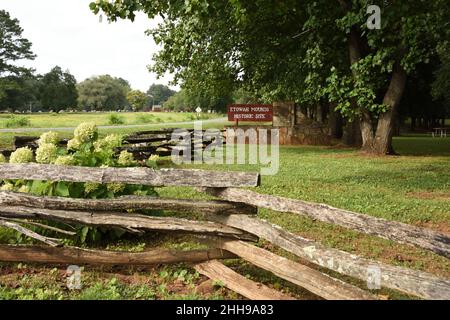 Beautiful landscape with wood fence in the foreground at Etowah Mounds Historic Site in Cartersville, Georgia, USA Stock Photo
