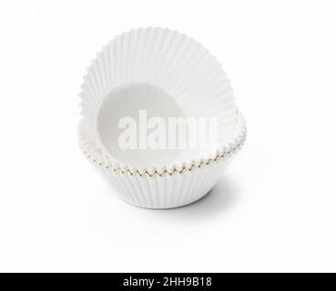 white paper corrugated cupcake baking dish on a white background Stock Photo