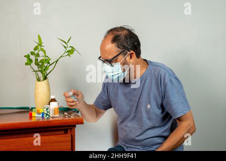 Senior man with shoulder pain. Middle-aged gentleman is in horrible pain. Neck and shoulder pain suffering from neck and shoulder injury, person with Stock Photo