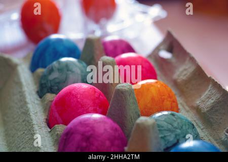 Out of focus. There are Easter eggs in a cardboard box. Holiday symbol. Stock Photo