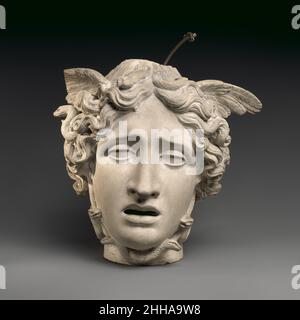 Head of Medusa 1806–7 Studio of Antonio Canova Italian On view in the Museum's Carroll and Milton Petrie European Sculpture Court is the marble version of Perseus with the Head of Medusa (67.110.1) that Canova carved for Countess Valeria Tarnowska. He wrote that he was also shipping a plaster of the Medusa head, lest the marble one add too much weight to the statue's outstretched arm. The countess could attach the lighter plaster to the arm instead, and, placing a lit candle inside the marble one, which is hollow, she could watch the eerie light effects. Like many other Neoclassical Medusa hea Stock Photo