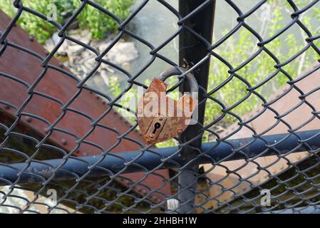 A rusty lock on the old Appalachian Trail Bridge in Harpers Ferry, West Virginia, U.S Stock Photo