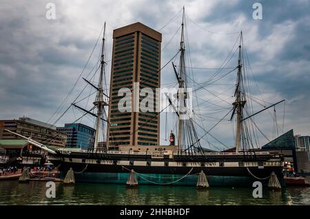 Photo of the USS Constitution and World Trade Center, Inner Harbor, Baltimore, Maryland USA Stock Photo