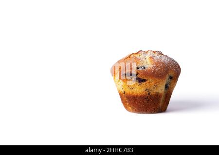 Vertical photo of an isolated muffin with chocolate and berries without paper. Front view. Stock Photo