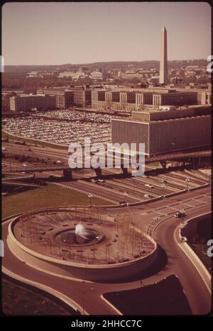 Southwest-washington-dc-with-south-end-of-lenfant-plaza-in-foreground-southwest-freeway-department-of-agriculture-and-washington-monument-beyond-april-1973 7461399464 o. Stock Photo