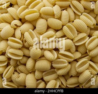 Raw Italian Gnocchetti Sardi Pasta Background. Close up. Stock Photo