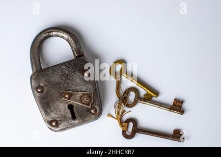 Vintage lock with three keys Stock Photo