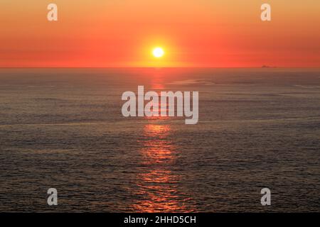 Vibrant Sunset over the Pacific Ocean in the Marin Headlands, California, USA. Stock Photo
