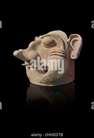 Ancient Greek Ceremonial terracotta masks depicting mythical creatures, Tiryns, Upper Citadel 'Bothros', 7th cent BC. Nafplion Archaeological Museum. Stock Photo