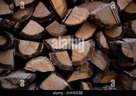 neatly stacked firewood, great background for design. Stock Photo