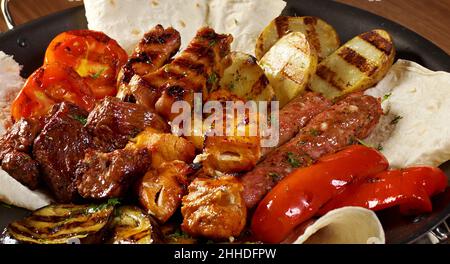 Paraguay Asado, traditional barbecue that is popular in Paraguay, Argentina, Chile and Uruguay, which consists of beef, sausages, and other meats Stock Photo