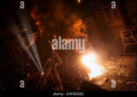 Discharge of liquid metal from a metallurgical furnace Stock Photo