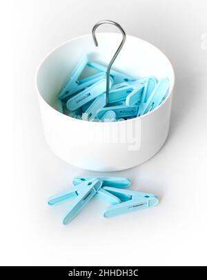 Blue clothespins isolated  on white background Stock Photo