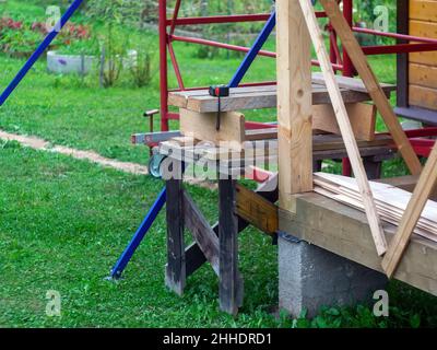 wooden beam for the construction of a rural house Stock Photo