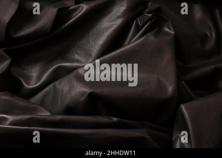 Black silk background luxury fabric texture, satin material, Christmas elegant abstract backdrop Stock Photo