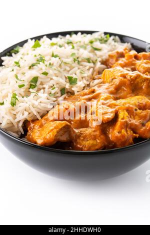 Indian butter chicken in black bowl isolated on white background Stock Photo