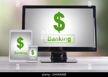 Banking concept shown on different information technology devices Stock Photo