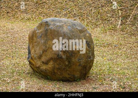 Large stones in the middle of the meadow in the garden which adds to the beauty. Stock Photo