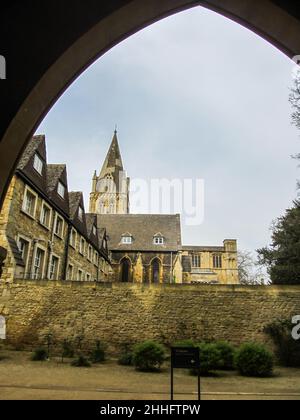 View of the Oxford Cathedral, UK, framed by an arched doorway. This church acts both as the chapel for Christ Church collage and the city’s Cathedral. Stock Photo