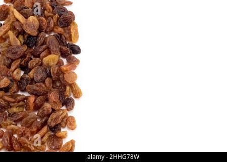 Tasty raisins isolated on a white background. Place for your advertising. Stock Photo