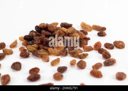 Tasty dried raisins isolated on a white background Stock Photo