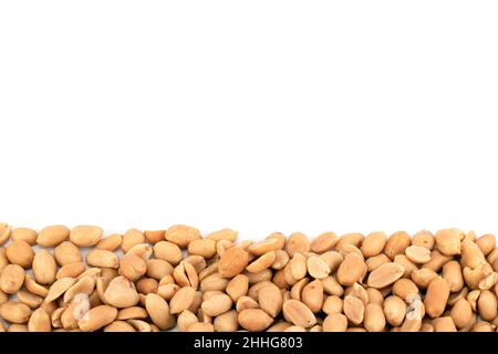 Salted peanuts background. Top view, close up, place for text. Blank for text. Stock Photo