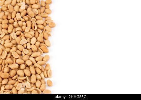 Salted peanuts background. Top view, close up, place for text. Blank for text. Stock Photo