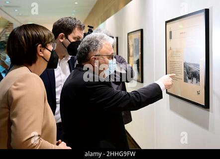 Berlin, Germany. 24th Jan, 2022. Jeremy Issacharoff (r), Israel's ambassador to Germany, visits the exhibition 'Auschwitz - a place on this earth' at the SPD headquarters (Willy Brandt House) with Saskia Esken (l) and Lars Klingbeil (M), chairmen of the SPD. In cooperation with the Embassy of Israel, the Freundeskreis Willy-Brandt-Haus presents the exhibition of the International Holocaust Memorial Yad Vashem. Credit: Tobias Schwarz/AFP-Pool/dpa/Alamy Live News Stock Photo
