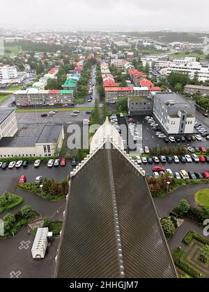 Beautiful aerial view of Reykjavik, Iceland, with scenery beyond the city, seen from the observation tower of Hallgrimskirkja Cathedral Stock Photo