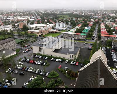 Beautiful aerial view of Reykjavik, Iceland, with scenery beyond the city, seen from the observation tower of Hallgrimskirkja Cathedral Stock Photo