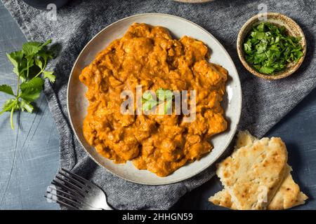 Homemade Indian Coconut Chicken Curry with Rice and Naan Bread Stock Photo
