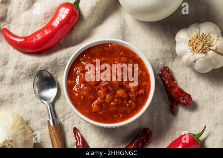 Homemade Organic Red Harissa Paste in a Bowl Stock Photo