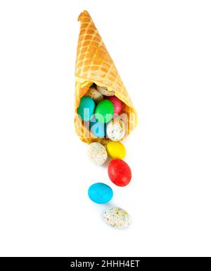 chocolate eggs in waffle cone isolated on white Stock Photo
