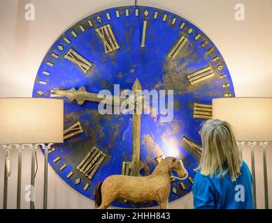 Battersea Park, London. 24 January 2022. Preview of the Winter 2022 Decorative Antiques & Textiles Fair which runs from 25-30 January with over 120 exhibitors taking part from every corner of the UK. Image: Large 19th century clock face with raised Roman numerals. Credit: Malcolm Park/Alamy Live News. Stock Photo