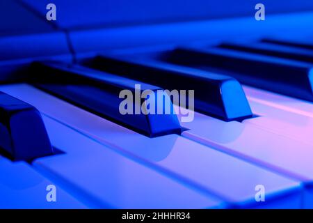 Digital piano keyboard in dark blueish color Stock Photo