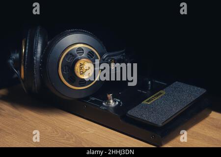AKG headphones in home studio on hotone guitar multieffect and amp simulator Stock Photo