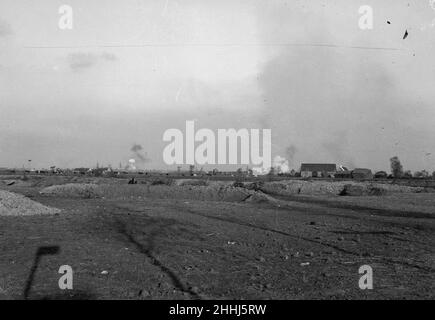 Shells bursting over the battlefield close to  Diksmuide during the Battle of  the Yser, Belgian army trenches can be seen in the foreground . Circa October 17th 1914 Stock Photo