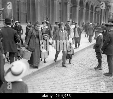 Refugees from the advancing German Army seen here  in Brussels. Circa 10th August 1914 Stock Photo