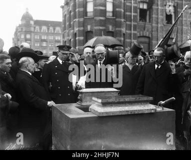 Vice Admiral Sir Roger Keyes and Lord Emmott laying the foundation stone of the Zeebrugge Mole Memorial. The memorial is sited at the shore close to the mole made famous during Royal Navy's  raid on the Belgium port towards the end of the First World War. The raid was led by Sir Roger Keyes. 24th April 1923. Stock Photo