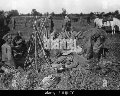 Russian soldiers seen here preparing a meal during their advance in to Galicia circa September 1914 Stock Photo