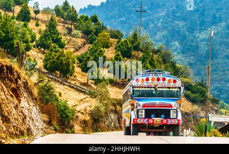 Old school bus used as public transport by Todos Santos Cuchumatan in Guatemala Stock Photo