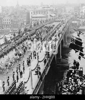 Coronation of King George V.The procession pictured crossing over London bridge. 22nd June 1911. Stock Photo