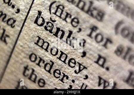 Word "bank" printed on dictionary page, macro close-up Stock Photo