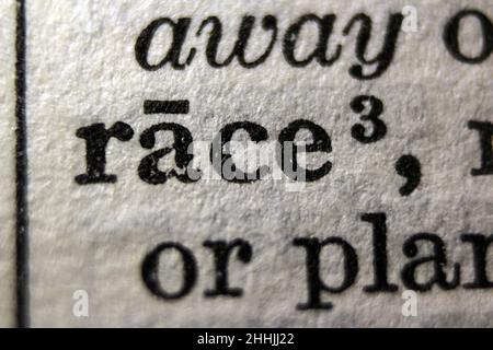 Definition of word race on dictionary page, close-up Stock Photo