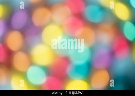 Blurred colourful bokeh of foil easter eggs Stock Photo