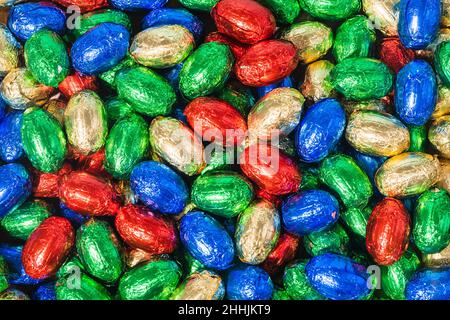Over Head Shot Of Colourful Chocolate Easter Eggs On Table Stock Photo