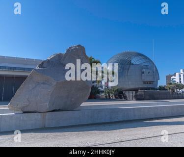 Los Angeles, CA, USA - January 26, 2022: The public art sculpture “Levitated Mass” by artist Michael Heizer is exhibited at LACMA in Los Angeles, CA. Stock Photo