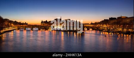 Sunrise in the heart of Paris with Ile de la Cite and Pont Neuf. The Seine River banks are a Unesco World Heritage site. France Stock Photo